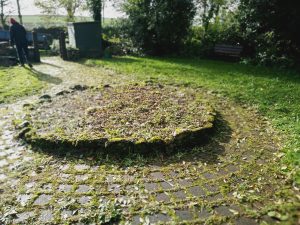 Red Roses memorial garden being tidied